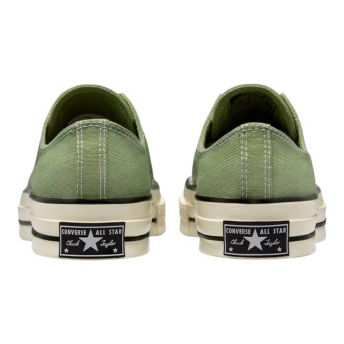 126 73 C | The Converse Chuck Low 70 Alligator Green/Utility/White combines vintage flair with a contemporary edge, featuring a durable canvas upper in a bold alligator green accented with utility and white tones. With its iconic low-top silhouette, cushioned insole, and textured rubber outsole, it delivers lasting comfort and reliable traction for everyday wear. Perfect for casual outfits or adding a pop of color to polished looks, this versatile sneaker is a stylish and timeless addition to any wardrobe.