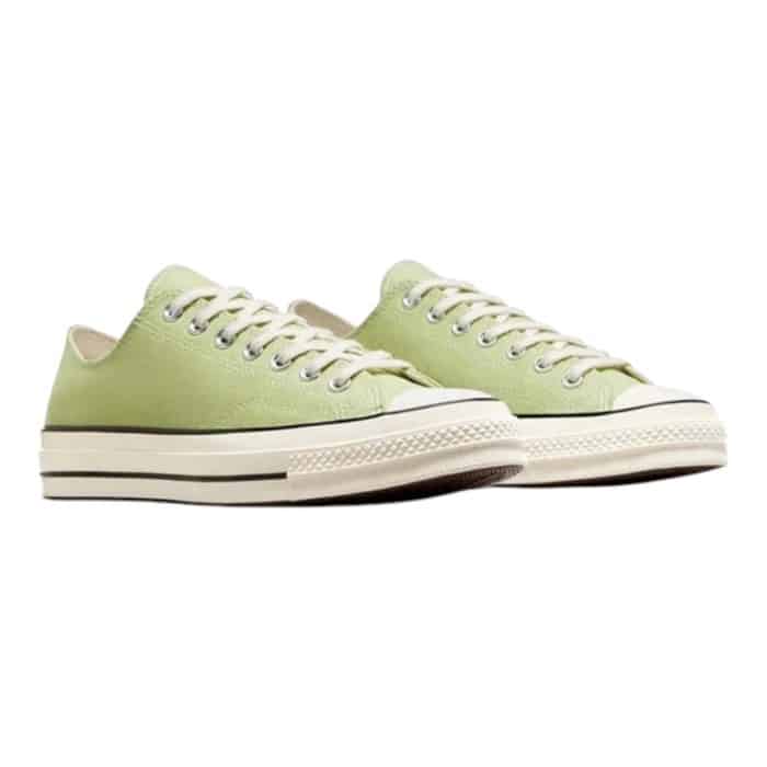 126 79 B | <hr /> The Converse Chuck 70 Low in Vitality Green, Egret and black effortlessly merges vintage charm with modern flair, making it a standout choice for any sneaker enthusiast. Its vibrant Vitality Green canvas upper is complemented by an Egret-colored midsole, delivering a bold yet balanced aesthetic that’s perfect for adding personality to any outfit. Crafted with premium materials, enhanced cushioning, and a timeless silhouette, this shoe provides exceptional comfort and durability, ensuring it remains a versatile and stylish staple for years to come.