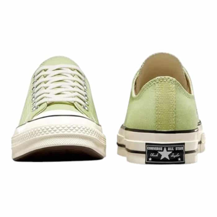 126 79 D | <hr /> The Converse Chuck Low 70 in Vitality Green, Egret and black effortlessly merges vintage charm with modern flair, making it a standout choice for any sneaker enthusiast. Its vibrant Vitality Green canvas upper is complemented by an Egret-colored midsole, delivering a bold yet balanced aesthetic that’s perfect for adding personality to any outfit. Crafted with premium materials, enhanced cushioning, and a timeless silhouette, this shoe provides exceptional comfort and durability, ensuring it remains a versatile and stylish staple for years to come.