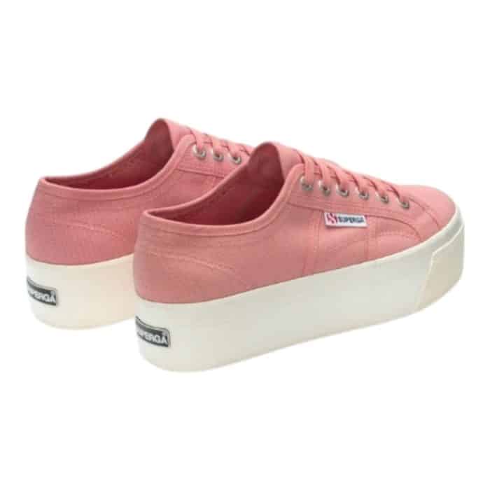 556 8 C | The Superga 2790 Platform Linea Up and Down in Pink Dusty-F Avorio combines a striking platform silhouette with a soft, feminine color palette, offering a bold yet elegant look perfect for elevating any outfit. Crafted with premium canvas and featuring a thick, textured rubber sole, this sneaker not only provides exceptional comfort and durability but also adds a trendy lift to your stride. The delicate pink dusty shade, accented with contrasting avorio details, brings a fresh, sophisticated vibe, making these platform sneakers an ideal choice for both casual outings and chic, everyday wear.