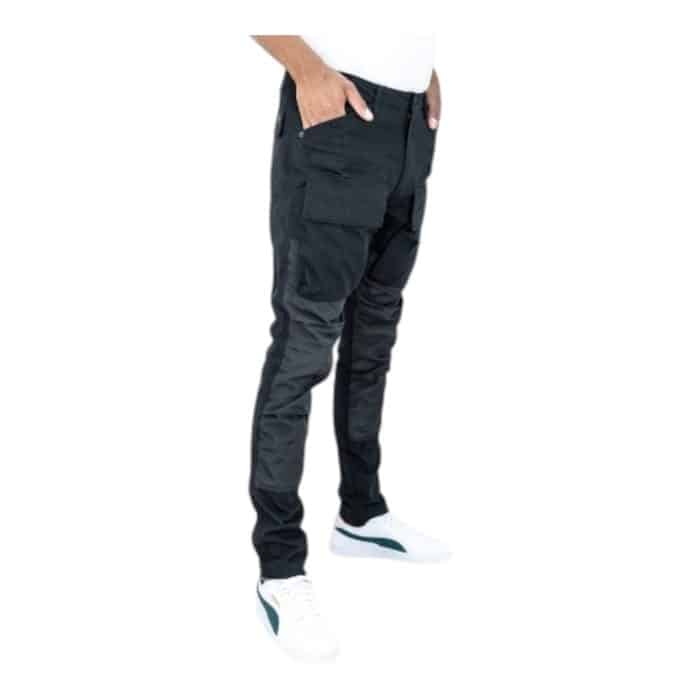 695 12 C | The Cutty Cargo Tobias Black blend rugged functionality with contemporary style, offering a versatile wardrobe essential for any occasion. Crafted from a durable yet comfortable cotton-blend fabric, these pants feature multiple spacious pockets and adjustable cuffs, combining practicality with a sleek, modern silhouette. Whether paired with casual sneakers or dressed up with polished footwear, the Tobias Black cargo pants adapt effortlessly to your lifestyle while ensuring long-lasting comfort and refined appeal.