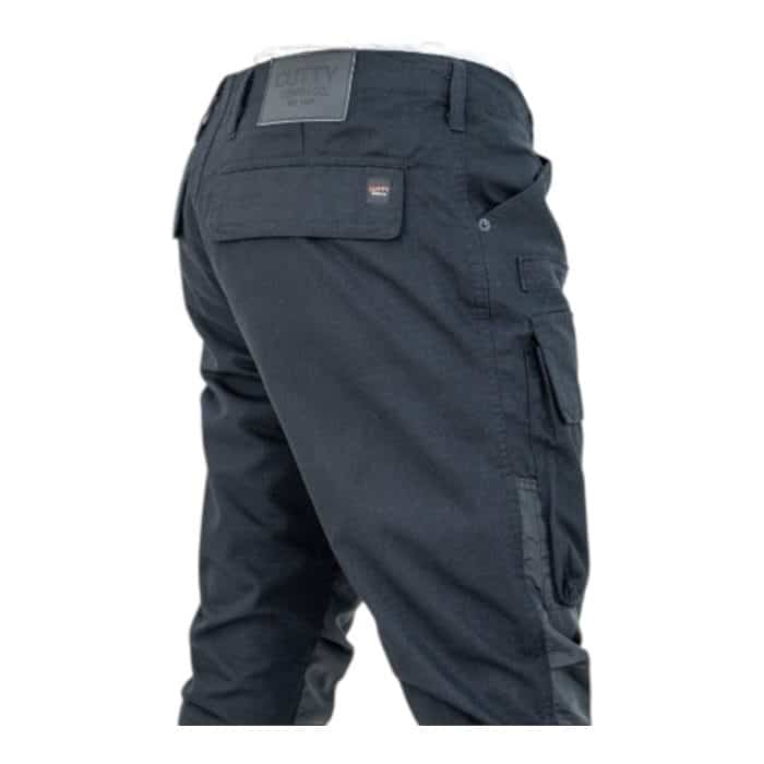 695 12 E | The Cutty Cargo Tobias Black blend rugged functionality with contemporary style, offering a versatile wardrobe essential for any occasion. Crafted from a durable yet comfortable cotton-blend fabric, these pants feature multiple spacious pockets and adjustable cuffs, combining practicality with a sleek, modern silhouette. Whether paired with casual sneakers or dressed up with polished footwear, the Tobias Black cargo pants adapt effortlessly to your lifestyle while ensuring long-lasting comfort and refined appeal.