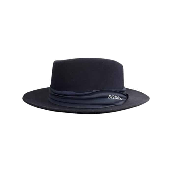 750 7A | The Dobbs Hat Frank Felt Navy is a premium fedora crafted from high-quality felt, featuring a rich navy color that adds a sophisticated edge to any outfit. Its timeless design, with a pinch-front crown, structured brim, and a refined ribbon band, blends classic elegance with modern versatility, making it ideal for both formal occasions and casual outings. Designed for all-day comfort, it includes a soft interior sweatband and lightweight construction, ensuring it remains as practical as it is stylish.