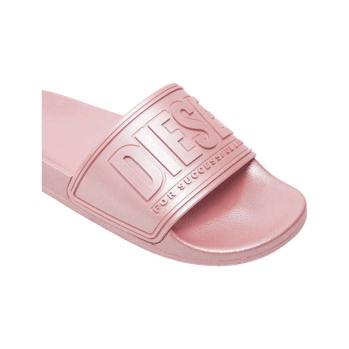 907 6D | The <em>Diesel Slides SA-Mayemi CC Rose</em> effortlessly combine style and comfort, featuring a striking rose pink finish that adds a bold touch to any casual outfit. Crafted from high-quality synthetic materials, these sandals offer a cushioned footbed for all-day comfort and support, while the slip-on design ensures easy wear and a secure fit. With a durable, textured sole providing excellent grip, these versatile sandals are perfect for everything from beach days to city strolls, making them an essential addition to your summer wardrobe.