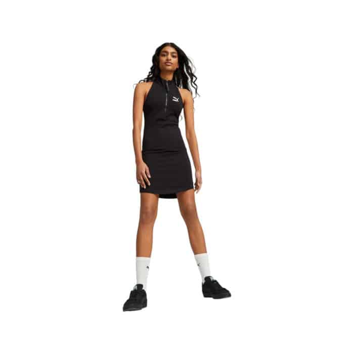 995 4 D | The Puma Dress T7 Half-Zip Mock Neck in Black combines sporty elegance with everyday comfort, featuring the iconic T7 design for a sleek and modern look that seamlessly transitions from casual to chic. Crafted from soft, breathable fabric, this dress offers a flattering slim fit that moves with your body, making it perfect for a variety of activities while maintaining a stylish silhouette. The half-zip mock neck adds versatility and warmth, allowing you to adjust the fit for personalized comfort, while the subtle Puma logo enhances its sporty aesthetic with a touch of brand authenticity.