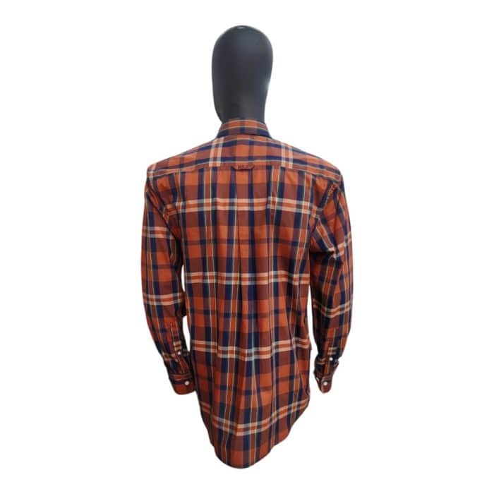 298 5 A | The Polo Shirt LS Relaxed Fit Weekender Bold Check Orange is a vibrant and stylish addition to your casual attire, featuring a striking bold check pattern that instantly captures attention while exuding a sense of relaxed sophistication. Crafted from soft, breathable fabric, this shirt ensures all-day comfort with its relaxed fit and long sleeves, making it perfect for weekend outings, casual gatherings, or simply enjoying a laid-back day at home. With its classic polo collar and versatile design, this shirt not only enhances your wardrobe but also offers endless styling options, allowing you to pair it effortlessly with jeans, chinos, or shorts for a polished yet casual look.