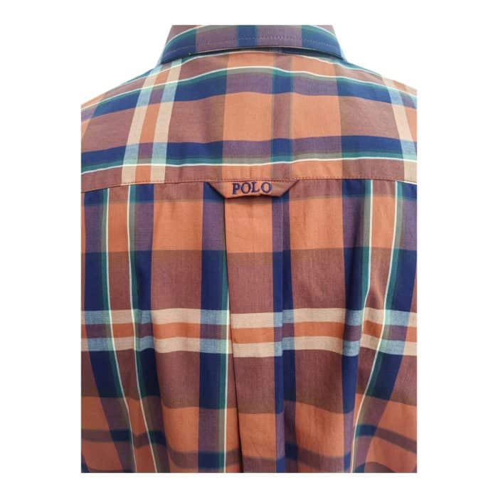 298 5 C | The Polo Shirt LS Relaxed Fit Weekender Bold Check Orange is a vibrant and stylish addition to your casual attire, featuring a striking bold check pattern that instantly captures attention while exuding a sense of relaxed sophistication. Crafted from soft, breathable fabric, this shirt ensures all-day comfort with its relaxed fit and long sleeves, making it perfect for weekend outings, casual gatherings, or simply enjoying a laid-back day at home. With its classic polo collar and versatile design, this shirt not only enhances your wardrobe but also offers endless styling options, allowing you to pair it effortlessly with jeans, chinos, or shorts for a polished yet casual look.