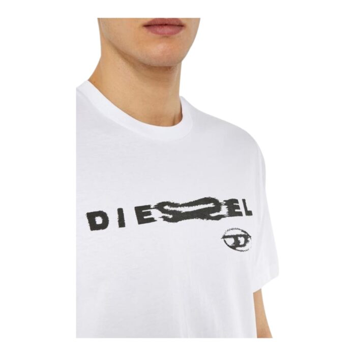 862 53 C | The Diesel T-Shirt T-Just G19 White combines minimalist style with premium comfort, making it a standout choice for casualwear. Crafted from 100% high-quality cotton, this lightweight and breathable t-shirt features a bold yet understated Diesel logo graphic that adds a modern edge to its classic crew neck and short sleeve design. Its versatile white hue and regular fit make it perfect for pairing with jeans, shorts, or layering under a jacket for effortlessly stylish looks.