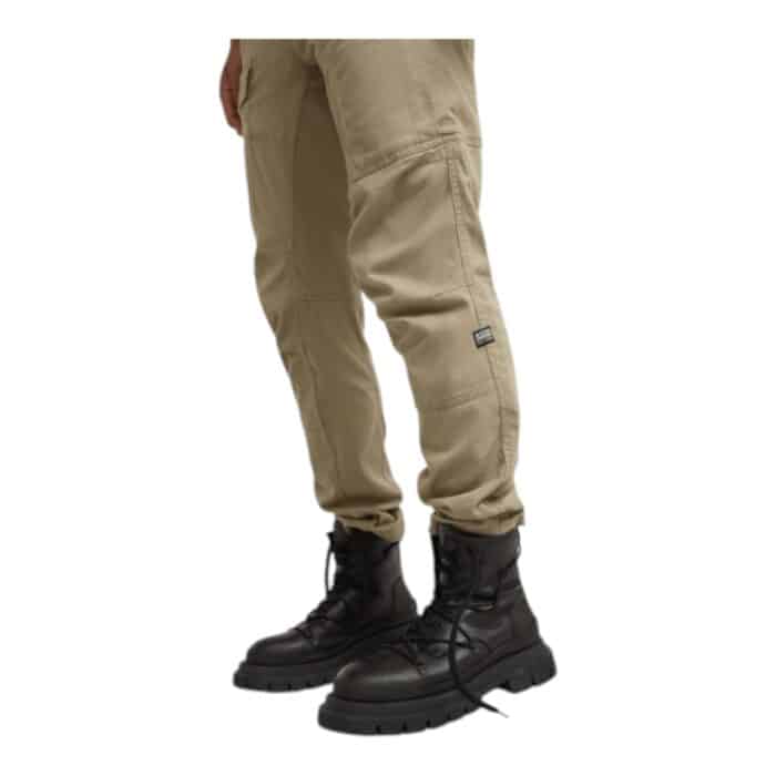 251 17 C | The G-Star Zip 3D Regular Tapered Dune pants combine modern design with unmatched comfort, featuring a tapered leg that provides a sleek and stylish silhouette while maintaining freedom of movement. Constructed from high-quality denim, these pants offer durability and softness, ensuring they withstand daily wear while keeping you comfortable throughout the day. With functional zippered pockets that enhance the contemporary look, these pants are perfect for those seeking a versatile, fashionable, and practical addition to their wardrobe.