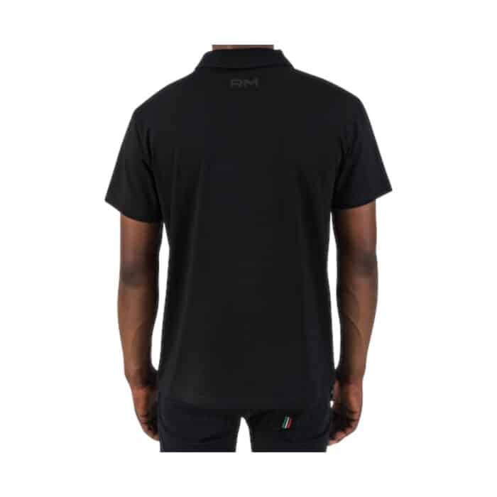 11 93 A | The Rossimoda T-Shirt Lucca Polo Black combines timeless style with exceptional comfort, making it a versatile addition to any wardrobe. Made from premium cotton, this polo offers a soft, breathable feel that keeps you comfortable throughout the day, whether you're dressing casually or looking for something to wear for a smart-casual occasion. With its classic design featuring a two-button placket, short sleeves, and a subtle logo on the chest, this black polo provides an effortlessly stylish and modern fit that can be easily paired with a variety of outfits, making it a must-have for both relaxed and refined looks.