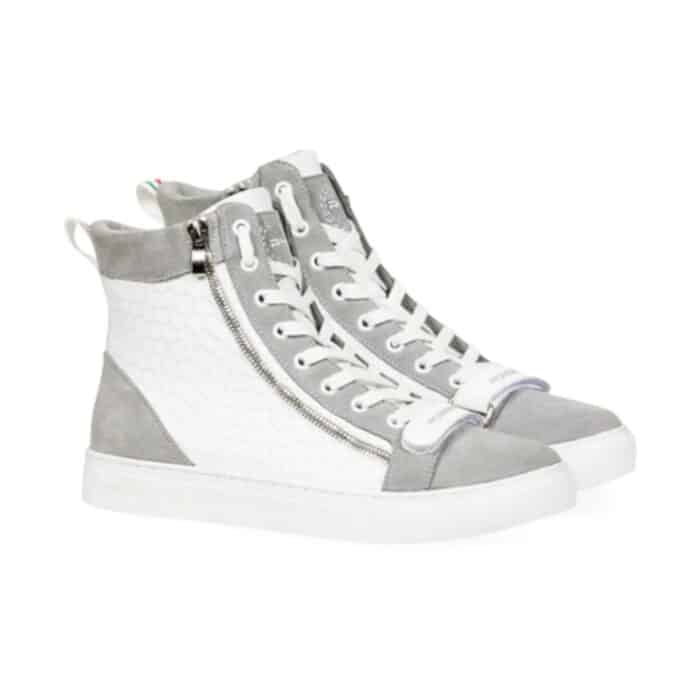 137 201 A | The Rossimoda Sneaker Alta WG White combines premium craftsmanship, contemporary elegance, and exceptional comfort, making it a must-have for those who appreciate high-end footwear with a minimalist yet sophisticated design. Crafted from high-quality leather, this high-top sneaker features a pristine white finish, a cushioned interior for all-day wear, and a durable rubber outsole that ensures superior grip and stability on various surfaces. With its breathable lining, ergonomic insole, and secure lace-up closure, this sneaker provides the perfect balance of style, support, and versatility, effortlessly complementing both casual and semi-formal attire.