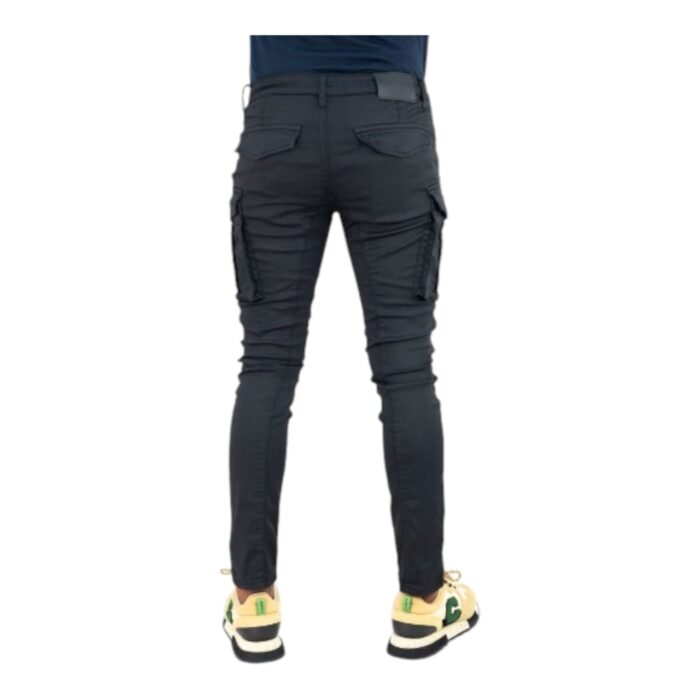 204 76 A | The Cutty Skinny Jeans Rocco Black offer a sleek, modern fit crafted from premium stretch denim, ensuring both style and comfort with a tapered silhouette that hugs the legs without feeling restrictive. Designed with a classic five-pocket layout, a secure zip fly with button closure, and reinforced belt loops, these jeans provide both practicality and a refined aesthetic, making them perfect for casual outings or dressed-up occasions. Their deep black wash remains rich and vibrant even after multiple wears, allowing for effortless pairing with various outfits while maintaining a timeless, fashion-forward appeal.