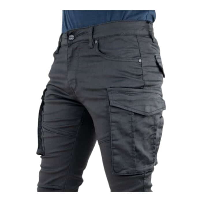 204 76 E | The Cutty Skinny Jeans Rocco Black offer a sleek, modern fit crafted from premium stretch denim, ensuring both style and comfort with a tapered silhouette that hugs the legs without feeling restrictive. Designed with a classic five-pocket layout, a secure zip fly with button closure, and reinforced belt loops, these jeans provide both practicality and a refined aesthetic, making them perfect for casual outings or dressed-up occasions. Their deep black wash remains rich and vibrant even after multiple wears, allowing for effortless pairing with various outfits while maintaining a timeless, fashion-forward appeal.