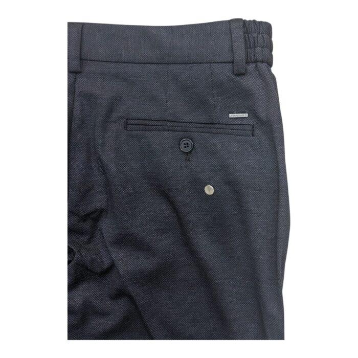 331 6 B rotated | The Jonathan D Chino Gian Charcoal combines timeless style with modern comfort, offering a sleek, slim-fit design in a sophisticated charcoal hue that seamlessly elevates any wardrobe. Crafted from a high-quality cotton blend, these chinos provide lasting durability, breathability, and a soft feel, making them perfect for all-day wear whether dressing up for a semi-formal event or keeping it casual for everyday outings. With their versatile design, subtle detailing, and effortless ability to pair with a wide range of shirts, jackets, and shoes, the Gian Charcoal chinos ensure both style and comfort are always at the forefront of your wardrobe choices.