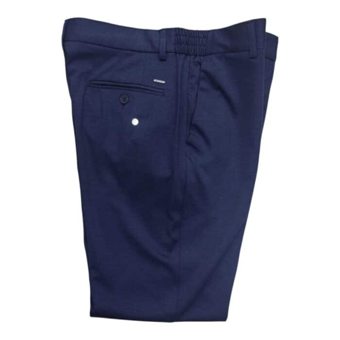 331 7 B | The Jonathan D Chino Regular Fit Navy is a sophisticated yet versatile wardrobe staple, crafted from high-quality cotton with a touch of elastane for durability, breathability, and all-day comfort, making it perfect for both casual and semi-formal occasions. Designed with a regular fit that provides ample room through the thighs and a tapered leg for a sleek silhouette, these chinos offer a refined look that pairs effortlessly with dress shirts, polos, or casual tees, adapting seamlessly to any style preference. With practical slanted front pockets, neatly stitched back pockets, and a rich navy hue that resists fading, this chino combines functionality with timeless elegance, ensuring you always step out in style.