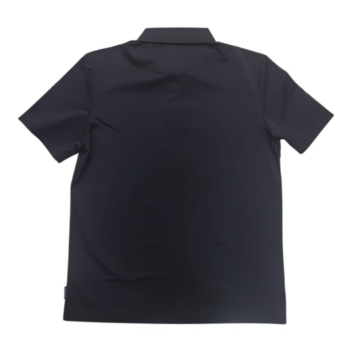 46 15 B | The Jonathan D Golfer Luan in Black is a sophisticated and versatile wardrobe essential, crafted from a premium cotton blend that ensures breathability, softness, and long-lasting comfort. Designed with a structured collar, a refined button placket, and impeccable stitching, this golfer offers a tailored fit that enhances your silhouette while maintaining ease of movement for any occasion. Whether paired with chinos for a polished look or worn casually with jeans, its deep black hue adds timeless elegance, making it the perfect choice for both smart and relaxed settings.