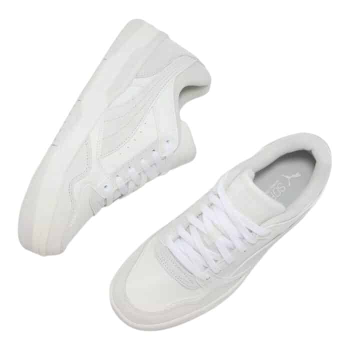 5 198 C | The Puma Rebound Retro SD White / Vapor Grey sneaker combines classic basketball-inspired design with modern comfort, featuring a high-quality leather upper that delivers durability and breathability, while the perforated side panels ensure optimal airflow for all-day wear. With its cushioned EVA foam midsole, this shoe offers superior comfort and support, making it ideal for both casual wear and light physical activities, providing a responsive feel with every step. The rubber outsole enhances grip and traction, ensuring stability on various surfaces, while the iconic Puma branding and retro silhouette add a timeless aesthetic that complements any casual outfit.