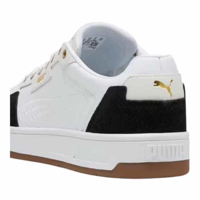 5 199 C | The Puma Court Classic Lux SD White/Black/Gold combines sophisticated design with exceptional comfort, featuring a smooth white leather upper accented with bold black and gold details, making it a versatile choice for both casual and dressy occasions. Equipped with Puma’s SoftFoam+ insole, this sneaker ensures all-day comfort by providing superior cushioning and support, while the durable rubber outsole delivers reliable traction for various activities. The Court Classic Lux SD is not only a stylish addition to your wardrobe, but also a practical and enduring choice, offering a perfect balance of luxury and functionality for everyday wear.