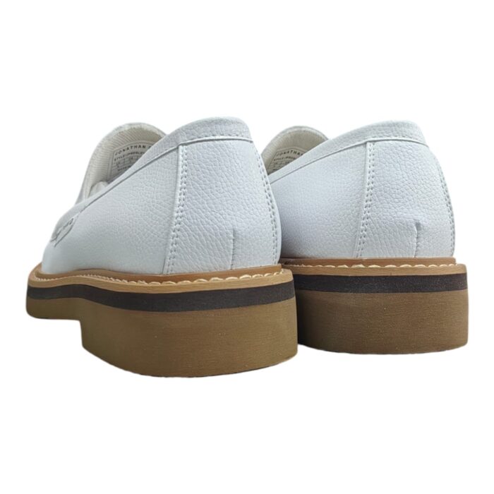 55 117 D | The Jonathan D Slip On Presley in White is a sleek and versatile footwear choice that combines modern minimalism with classic sophistication, making it perfect for both casual and semi-formal occasions. Crafted from high-quality materials, this slip-on shoe features a durable yet comfortable design with a soft upper that molds to the foot, a cushioned insole for all-day support, and a sturdy outsole that ensures excellent traction on various surfaces. Its crisp white color enhances its effortless elegance, while the absence of laces provides a clean, streamlined look that pairs seamlessly with anything from tailored trousers to relaxed denim.