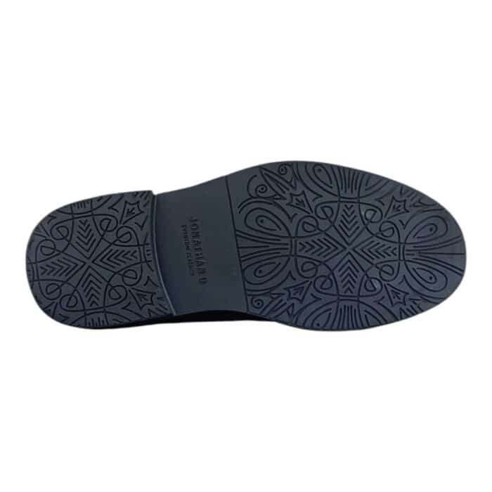 55 118 C | The Jonathan D Slip-On Persley Black is a sophisticated and versatile footwear choice, crafted with premium materials that ensure durability, comfort, and effortless style for any occasion. Designed with a sleek black finish, elastic side gussets for a secure fit, and a cushioned footbed for all-day support, this shoe seamlessly blends practicality with modern elegance, making it ideal for both formal and casual wear. Whether paired with tailored suits for business meetings or relaxed denim for weekend outings, the Persley Black offers a timeless aesthetic that enhances any wardrobe with its refined, minimalist appeal.