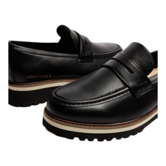 55 66 C | The <strong data-start="4" data-end="37">Jonathan D Penny Moc PU Black</strong> is a sleek and stylish slip-on shoe crafted from high-quality PU leather, offering a polished black finish that combines durability with modern design. Featuring a cushioned insole and soft lining, this shoe ensures all-day comfort, making it perfect for both casual and semi-formal occasions, while its lightweight construction allows for easy wear without compromising support. With its versatile design and timeless black color, the Jonathan D Penny Moc seamlessly fits into any wardrobe, effortlessly elevating your look for any event or outing.