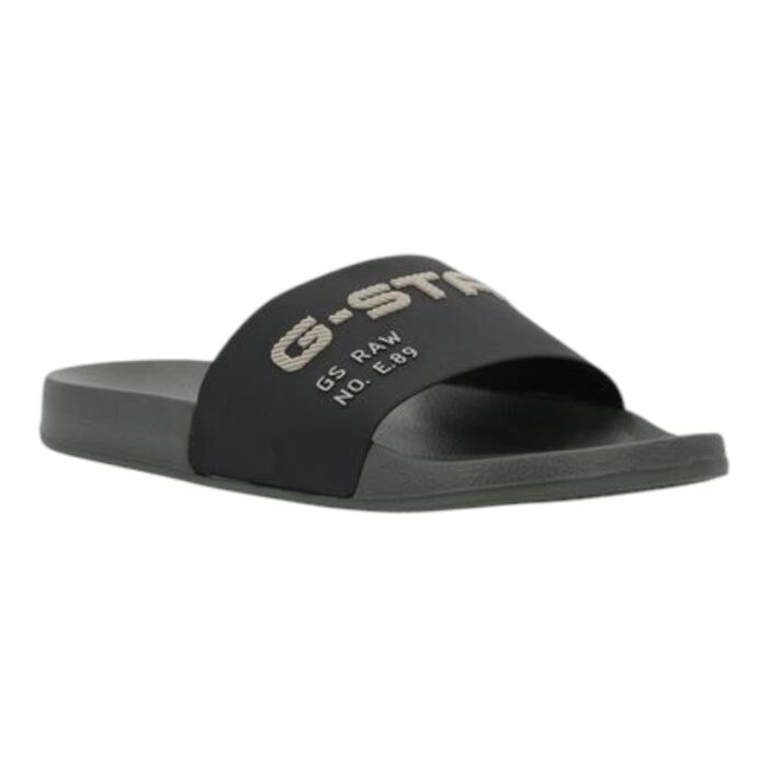 894 7 A | The G-Star Cart V TPU Slides in Black combine minimalist aesthetics with superior comfort, featuring a sleek monochromatic design and a durable TPU construction that ensures long-lasting wear. The ergonomically contoured footbed provides exceptional support and cushioning, making these slides perfect for all-day use, whether you’re relaxing at home or stepping out for casual errands. With a stylish yet understated look, these versatile slides effortlessly complement various outfits while delivering the practicality and durability expected from G-Star’s high-quality craftsmanship.