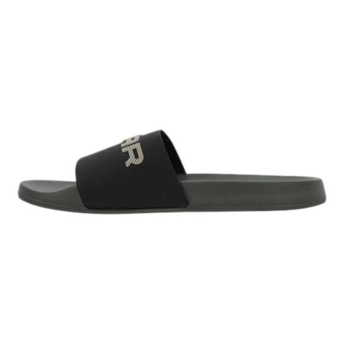 894 7 D | The G-Star Cart V TPU Slides in Black combine minimalist aesthetics with superior comfort, featuring a sleek monochromatic design and a durable TPU construction that ensures long-lasting wear. The ergonomically contoured footbed provides exceptional support and cushioning, making these slides perfect for all-day use, whether you’re relaxing at home or stepping out for casual errands. With a stylish yet understated look, these versatile slides effortlessly complement various outfits while delivering the practicality and durability expected from G-Star’s high-quality craftsmanship.