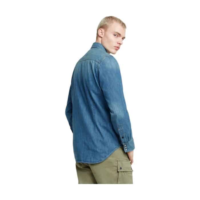 919 4 B | The G-Star Slim Fit Dakota Shirt Faded Denim is a stylish, versatile piece that combines a modern slim fit with the timeless appeal of faded denim, offering a flattering silhouette for any occasion. Crafted from high-quality denim, this shirt is soft yet durable, ensuring comfort and longevity while maintaining its shape and vibrant look even after repeated wear. Featuring subtle design details like a button-down collar, front button closure, and functional pocket accents, this shirt easily transitions from casual to semi-formal settings, making it a perfect addition to any wardrobe.